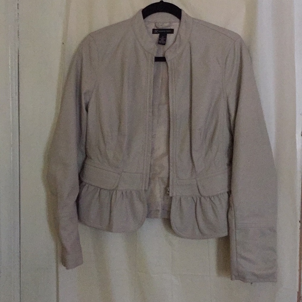 INC leather like ruffle hem jacket, size small.
